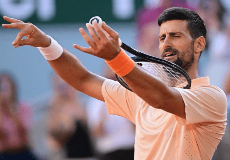 Djokovic advances to French Open third round in four sets
